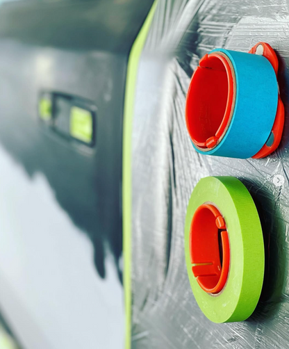Collision Edge Tape Thing magnetic masking tape holder for professional painters, available in ¾-inch, 1-inch, 1½-inch, and 2-inch sizes.